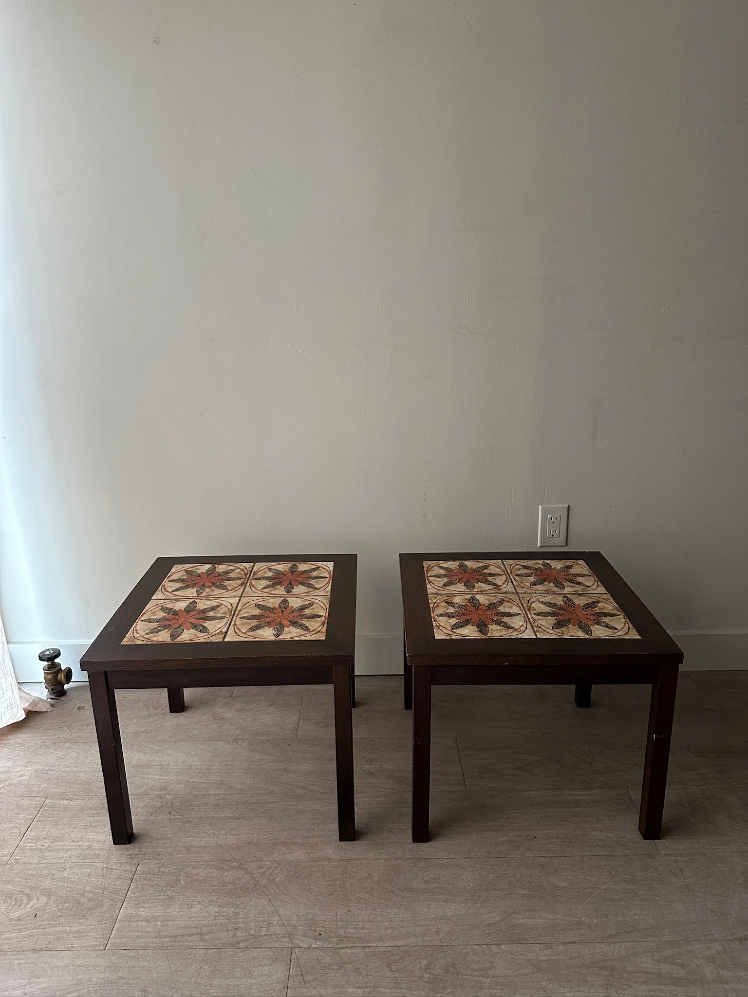 2 Toften Danish rosewood and tile side tables. Sold individually.