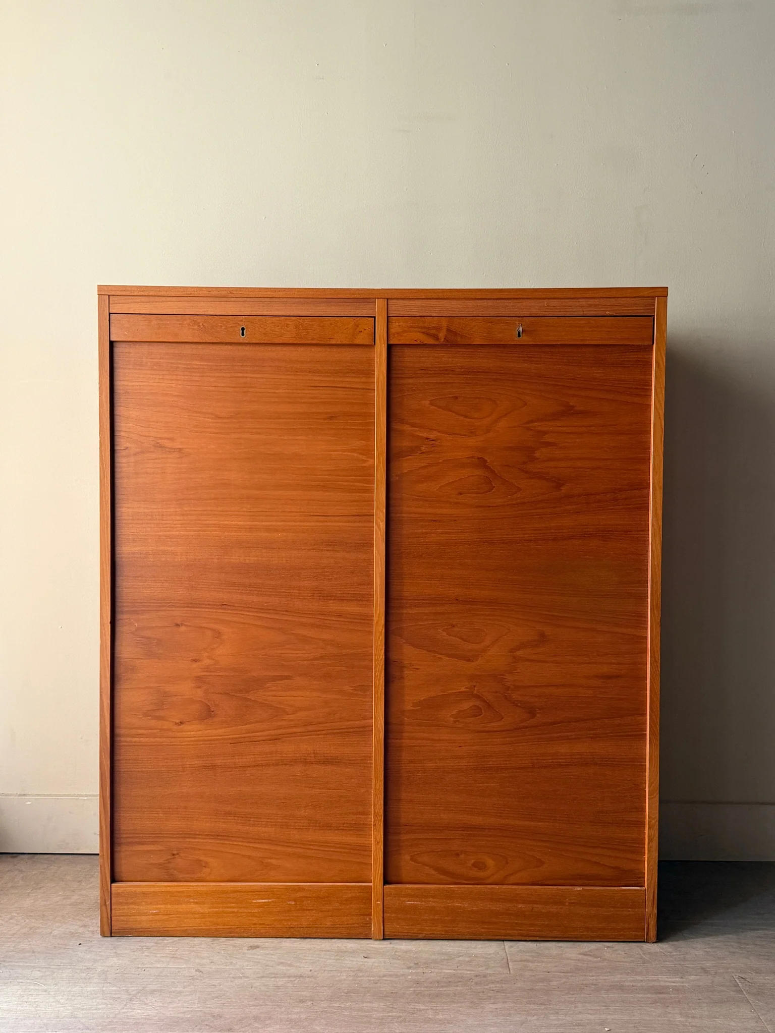 Danish teak tambour door filing cabinet