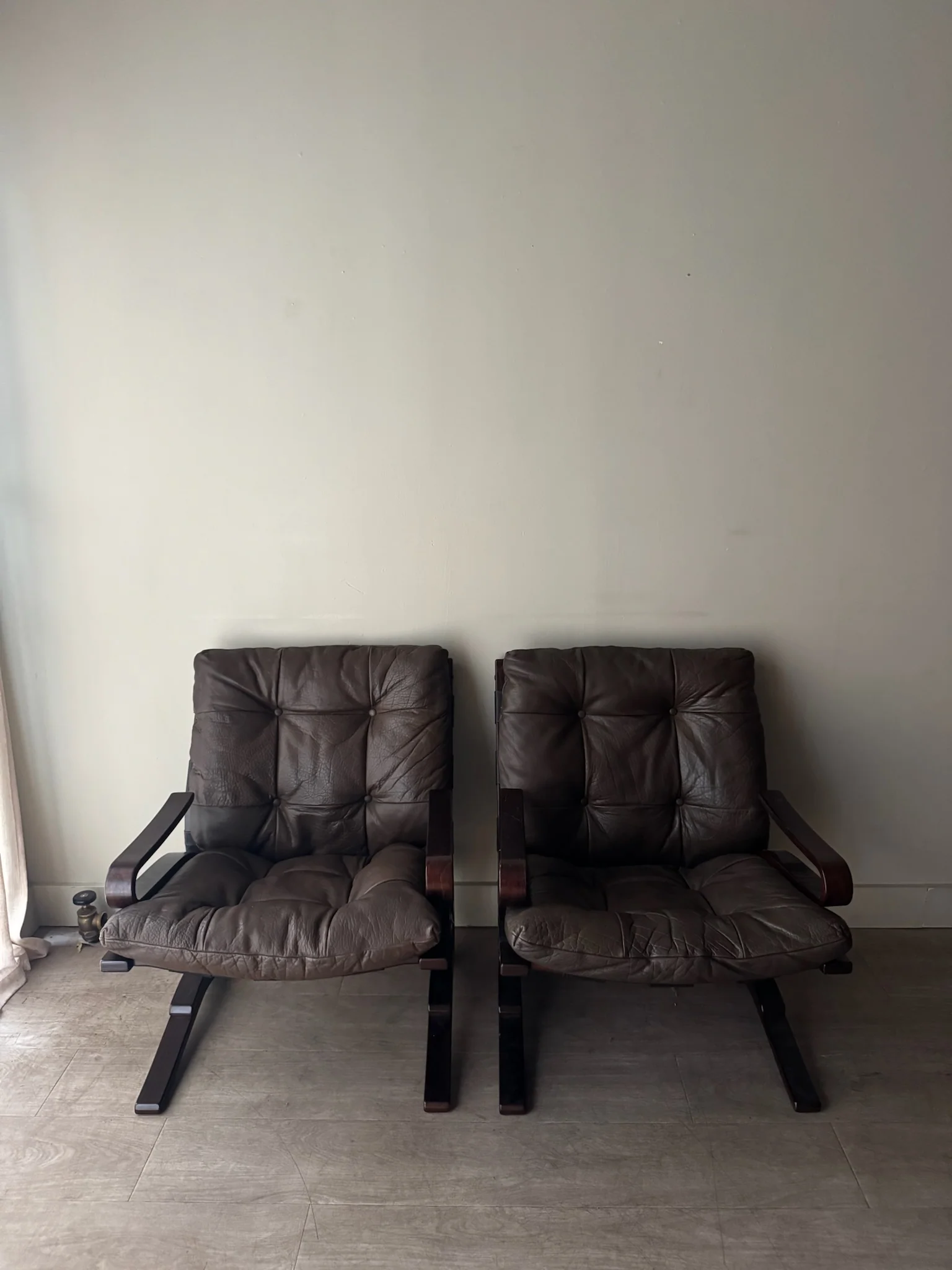 Einar Hove Norwegian brown leather lounge chairs. Sold individually.