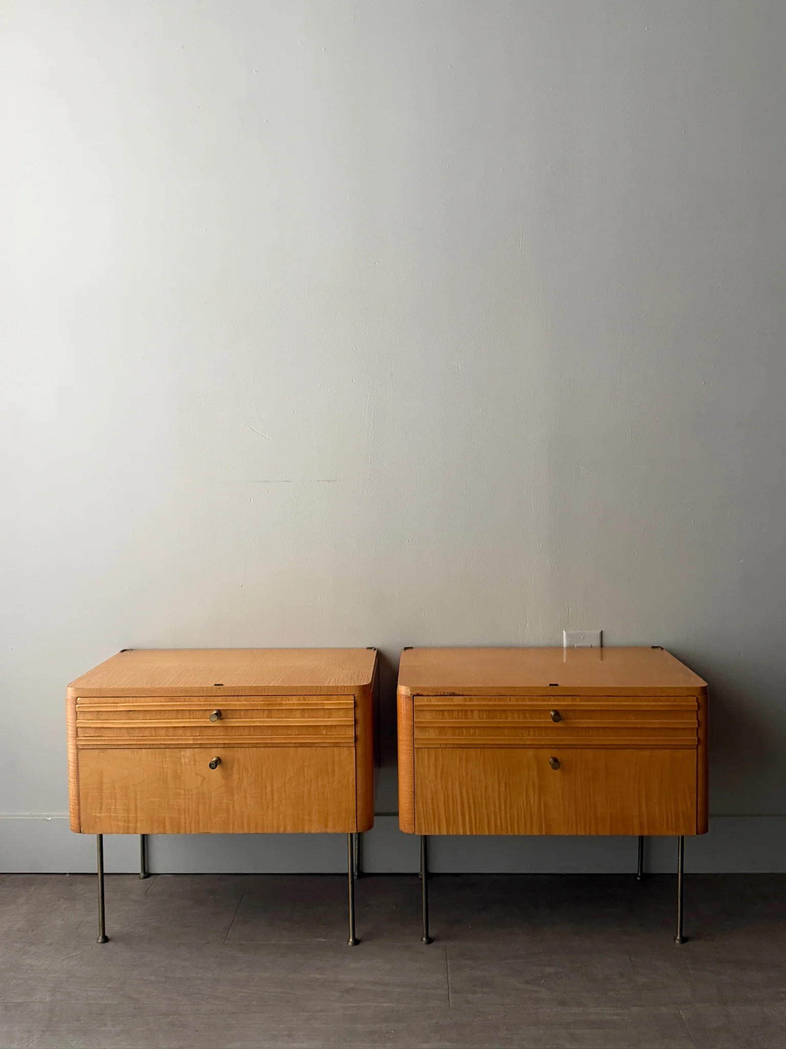 Figured maple nightstands. Sold as a pair.