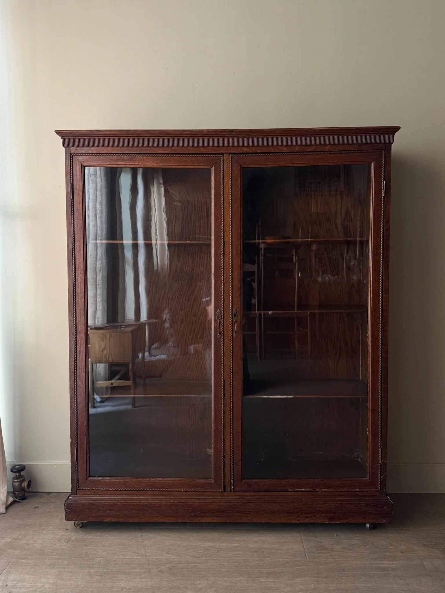 Golden oak display cabinet