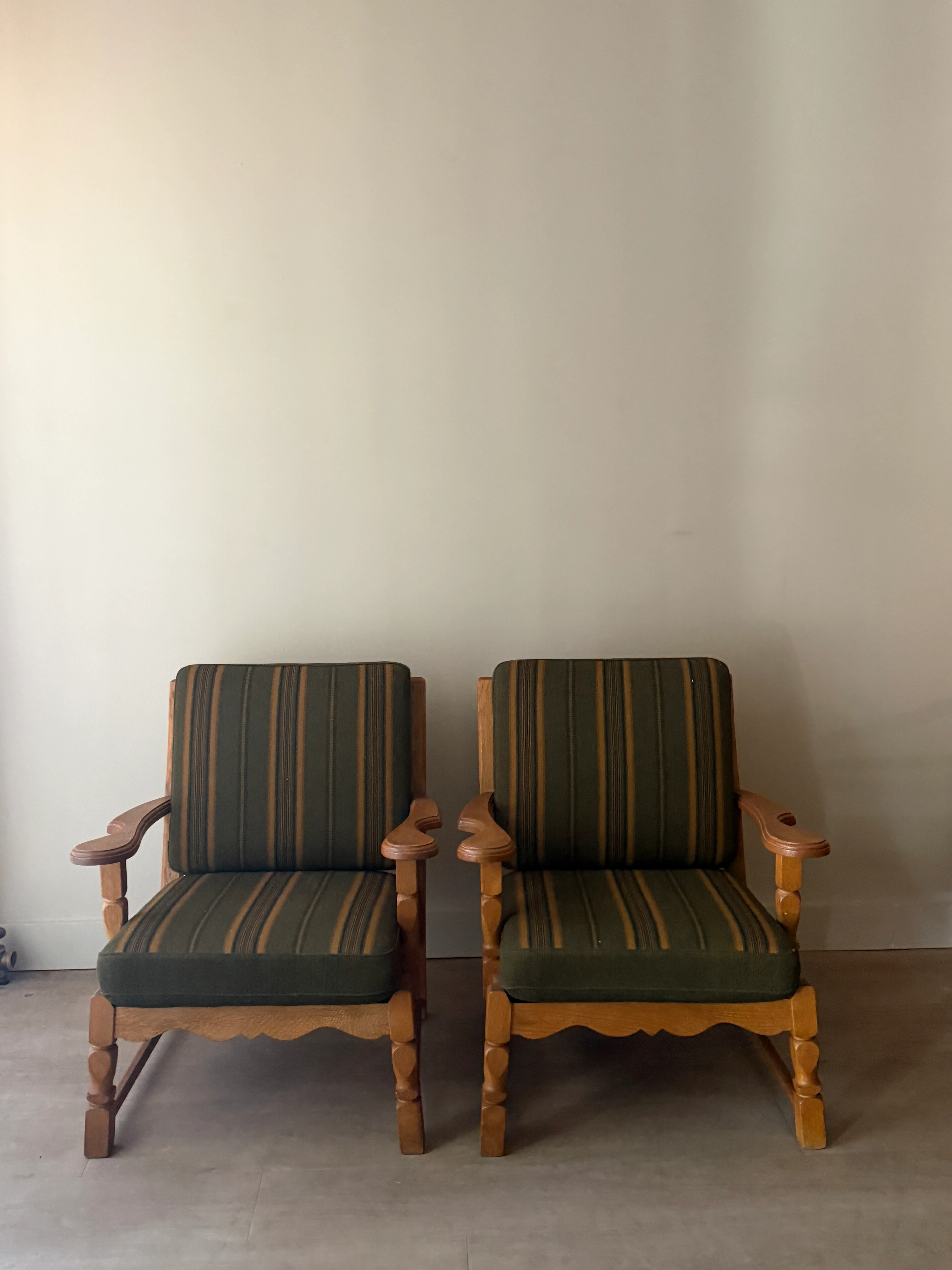 Henning Kjaernulf Danish oak lounge chairs. Sold individually.