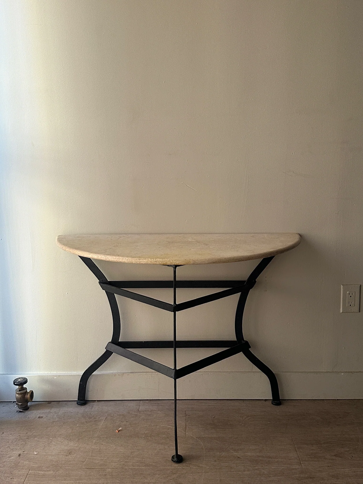 Travertine demilune table