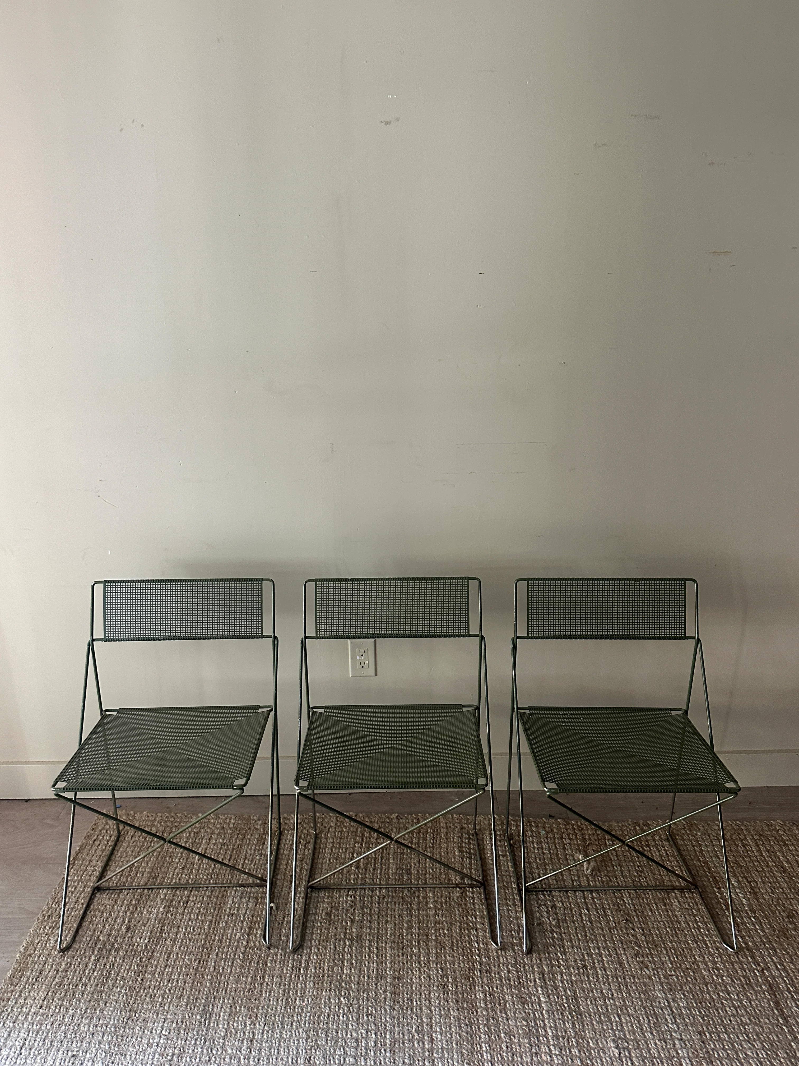 Niels Jorgen Haugesen metal chairs. Sold individually.