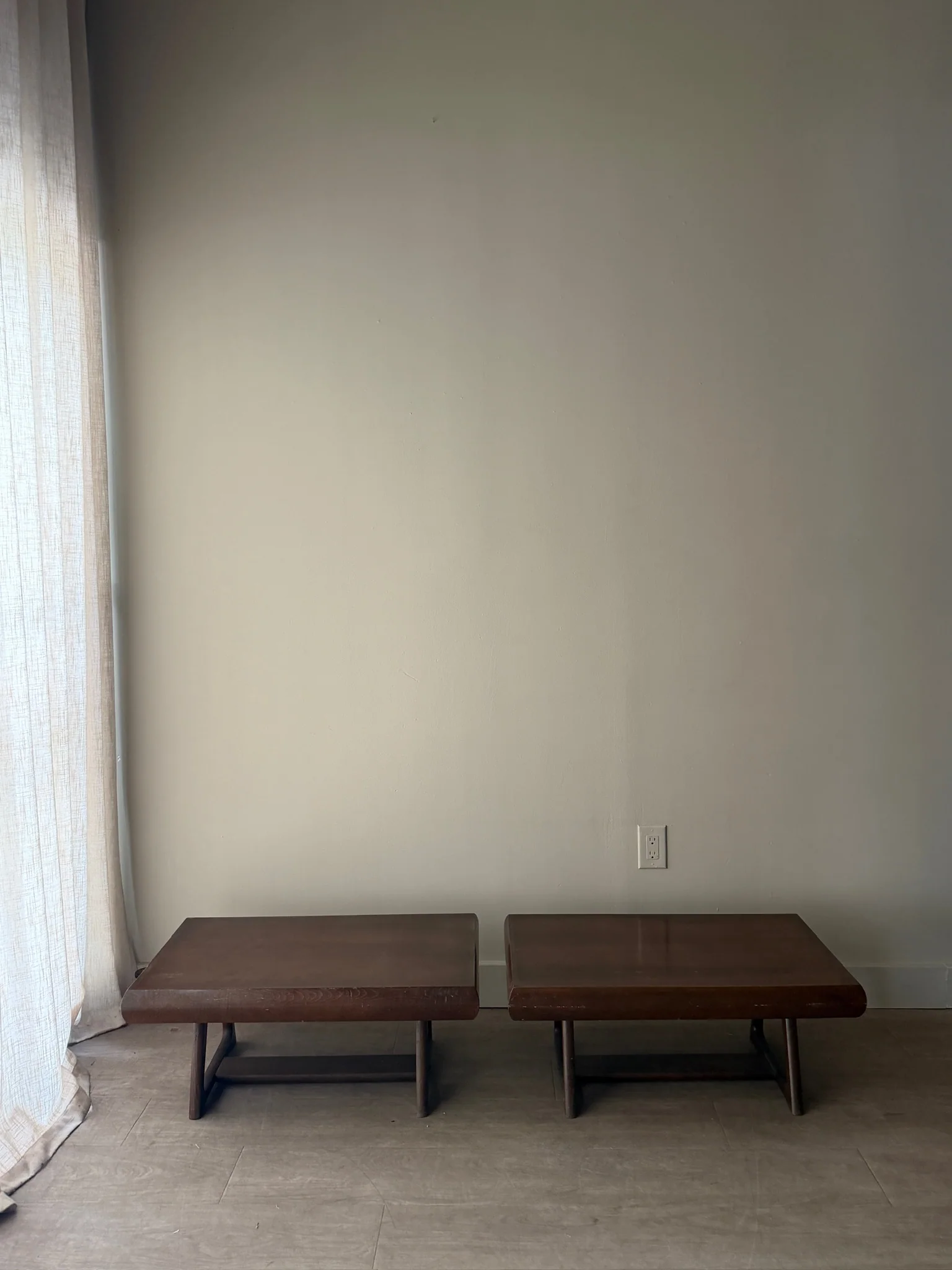 Walnut coffee tables. Sold individually.