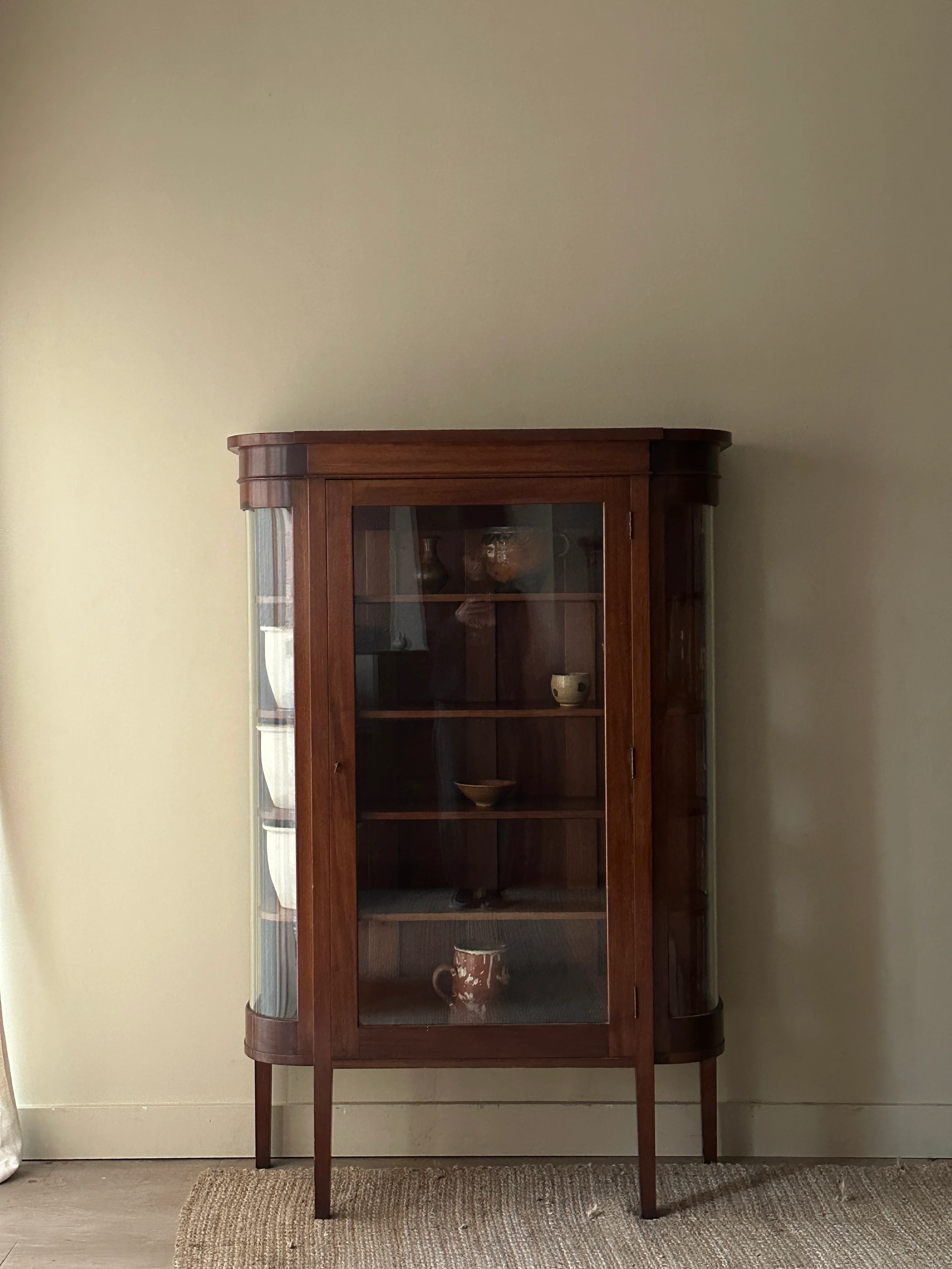 Walnut curio cabinet