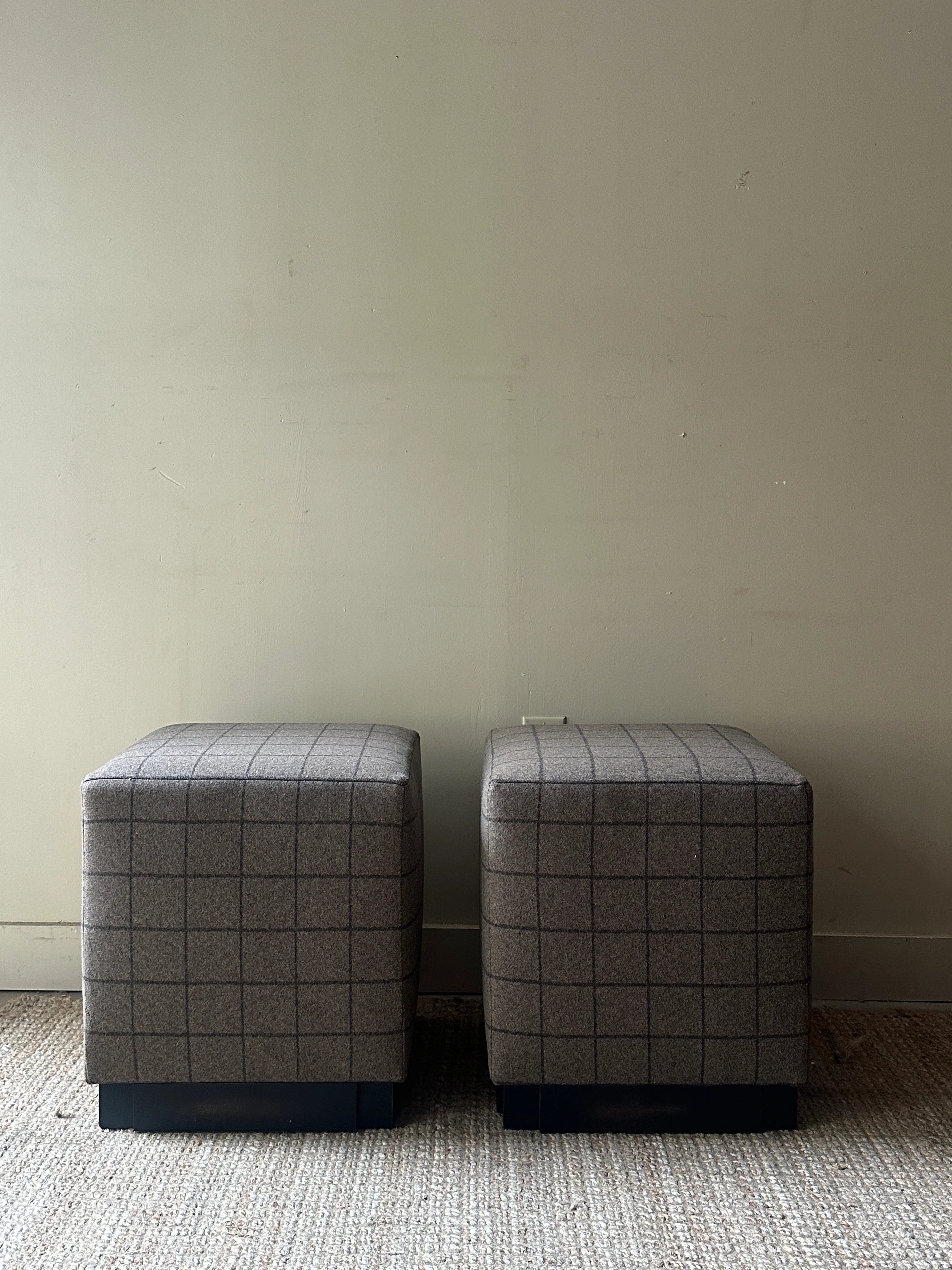 Wool ottomans. Holes in fabric on two sides.